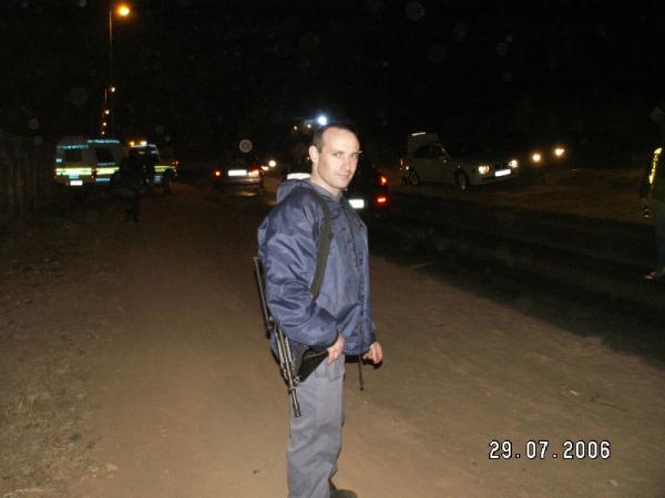 this is me , in winter , on a boring roadblock .... not looking 
too happy ... but im carrying a Z88 pistol (like the beretta 92FS) and an R5 assualt 