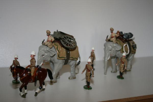 Under Two Flags - Elephants with gatling gun and supplies