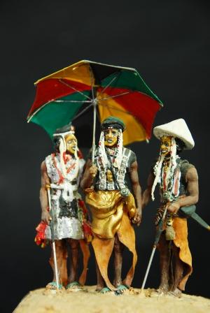 Wodaabe Tribesmen preening themselves for tribal dance to attract the women. Scratchbuilt.